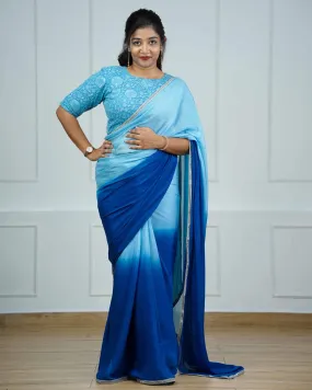 Aqua blue and navy blue double shaded saree with matching embroidered, unstitched blouse piece