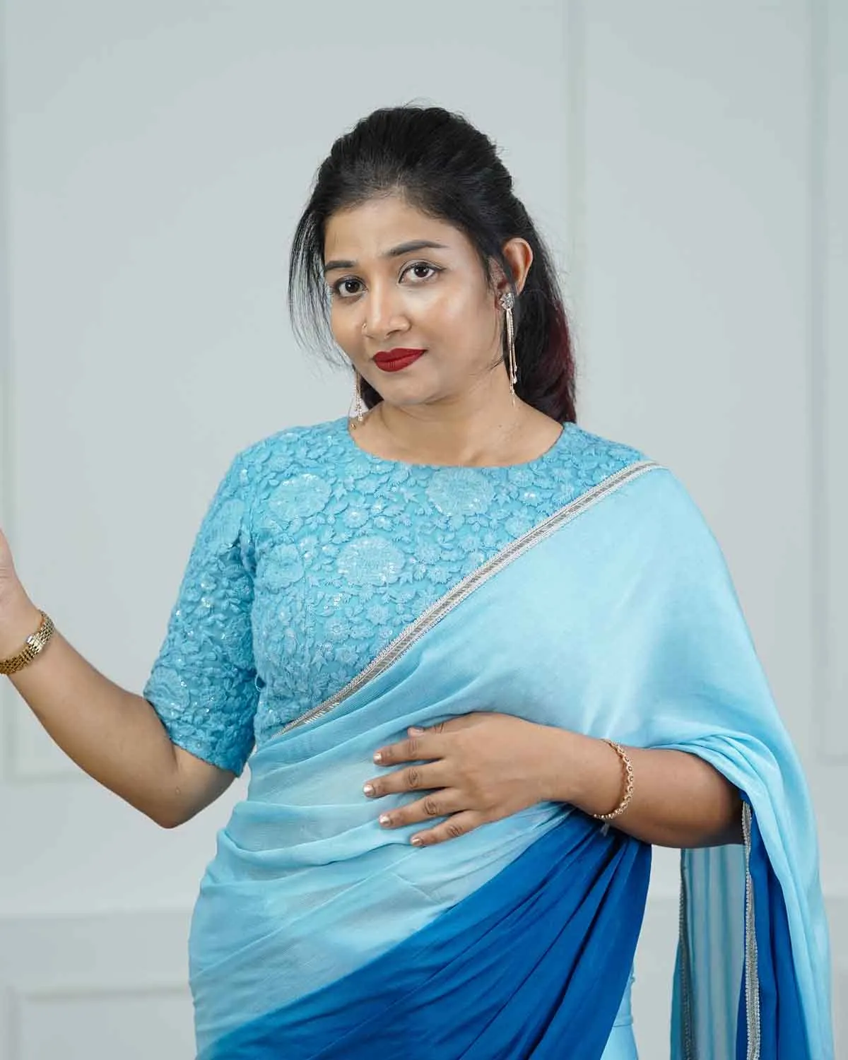 Aqua blue and navy blue double shaded saree with matching embroidered, unstitched blouse piece