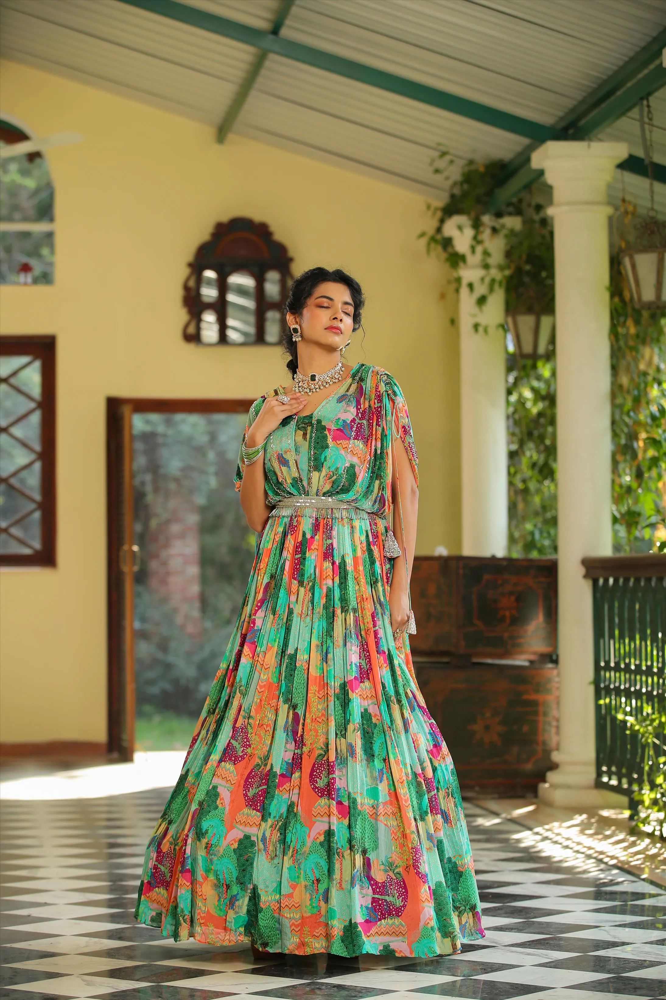 Green Chinon Silk Jungle Print Party Gown With Belt & Attached Cape