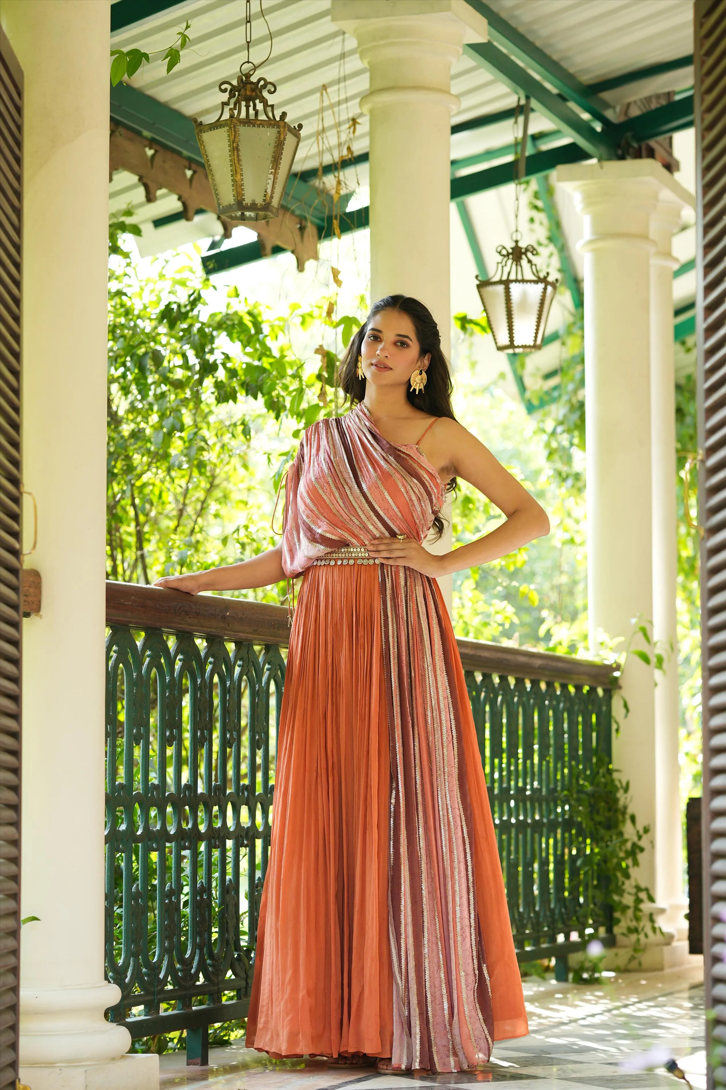 Rust Chinon Silk Sequinned Party Gown With Belt And Attached One-Shoulder Cape & Drape