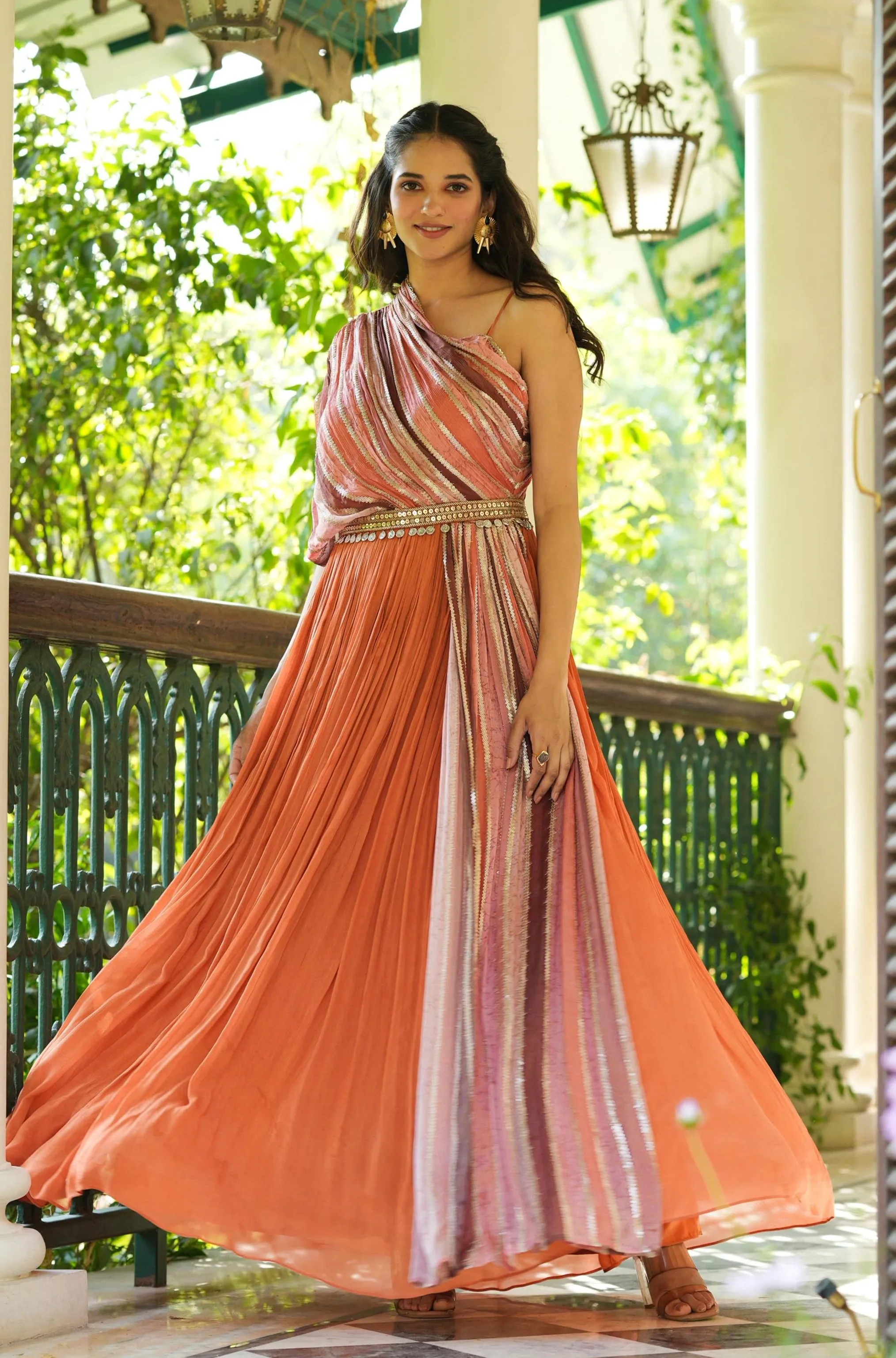 Rust Chinon Silk Sequinned Party Gown With Belt And Attached One-Shoulder Cape & Drape