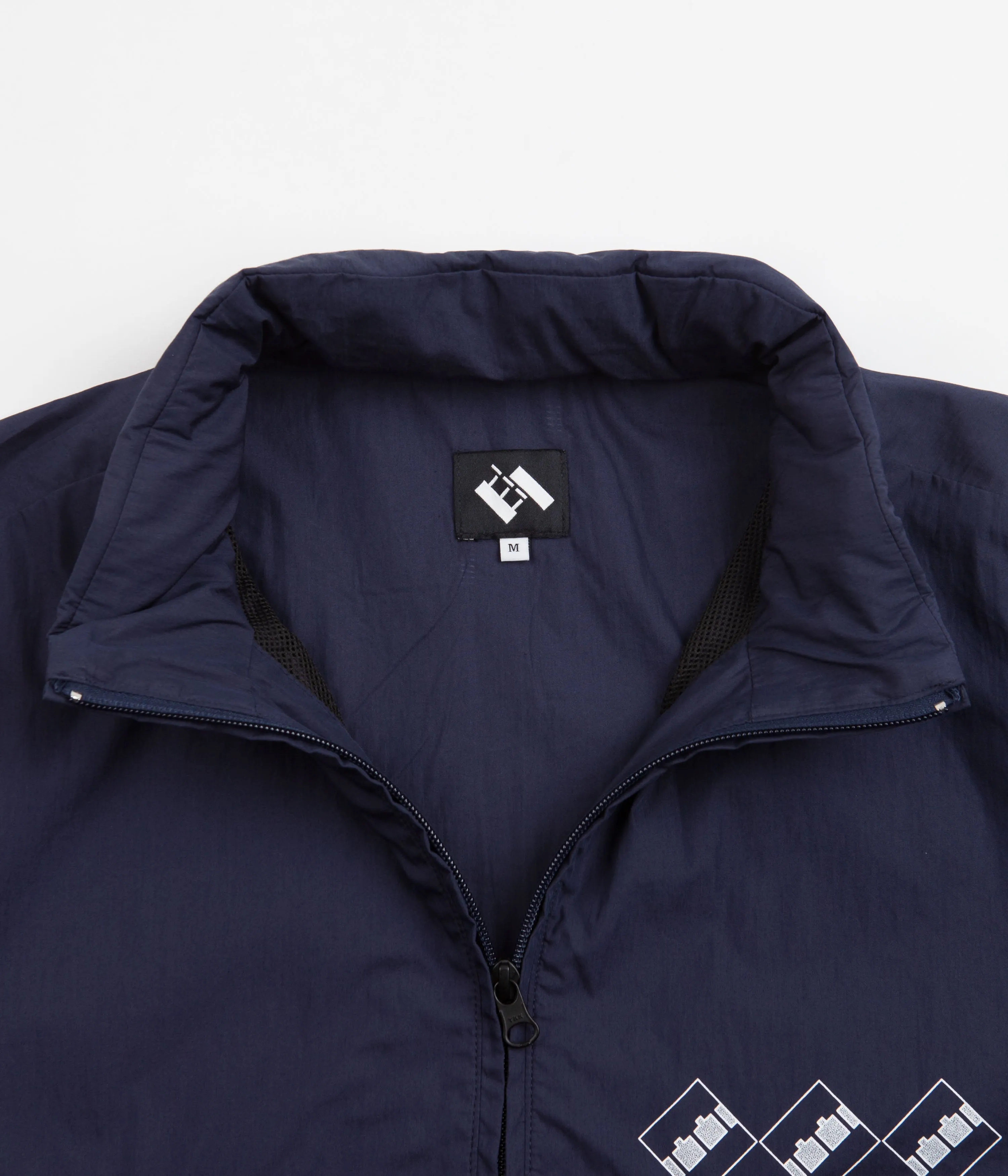 The Trilogy Tapes Packable Festival Jacket - Navy / Black